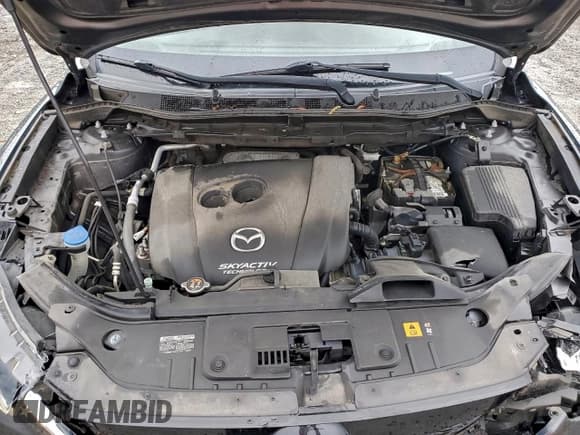 ✅ 2015 Mazda CX-5 Sport • VIN: JM3KE2BE0F0502750 • Lot: 93753425. Listed on Copart with 101,312 mi. Free auction sales archive from the USA and detailed vehicle history report at DreamBid. Image 12.