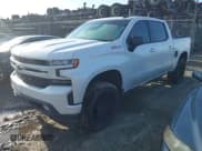✅ 2021 Chevrolet Silverado 1500 RST • VIN: 3GCUYEEL7MG279622 • Lot: 43081221. Listed on IAAI with 138,000 mi. Free auction sales archive from the USA and detailed vehicle history report at DreamBid. Image 2.