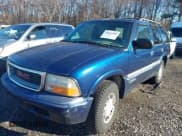 ✅ 2000 GMC Jimmy SLE Convenience • VIN: 1GKDT13W4Y2359595 • Lot: 43769400. Wystawiony na IAAI z przebiegiem 148 913 mil. Bezpłatny archiwum sprzedaży aukcyjnych z USA i szczegółowy raport historii pojazdu na DreamBid. Zdjęcie 6.