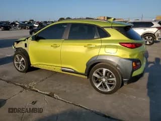 ✅ 2020 Hyundai Kona Ultimate • VIN: KM8K53A58LU546270 • Лот: 69428144. Опубликован ранее на Copart с пробегом 76 694 миль. Бесплатный доступ к архиву аукционных продаж из США и подробный отчёт об истории автомобиля на DreamBid. Изображение 2.
