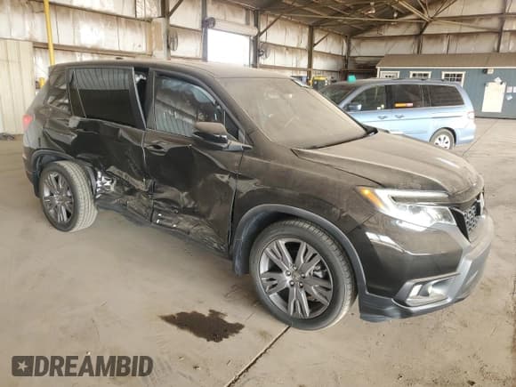 ✅ 2019 Honda Passport EX-L • VIN: 5FNYF7H51KB011636 • Lot: 71486995. Listed on Copart with 42,723 mi. Free auction sales archive from the USA and detailed vehicle history report at DreamBid. Image 4.