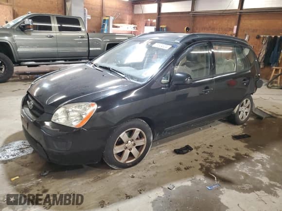 ✅ 2008 Kia Rondo LX • VIN: KNAFG526987124689 • Лот: 71624324. Опубликован ранее на Copart с пробегом 157 291 миль. Бесплатный доступ к архиву аукционных продаж из США и подробный отчёт об истории автомобиля на DreamBid. Изображение 1.