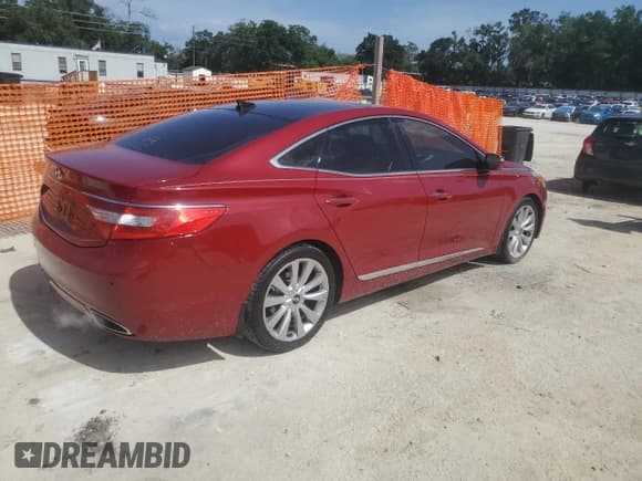 ✅ 2013 Hyundai Azera • VIN: KMHFH4JG8DA330003 • Лот: 66338915. Опубликован ранее на Copart с пробегом 141 010 миль. Бесплатный доступ к архиву аукционных продаж из США и подробный отчёт об истории автомобиля на DreamBid. Изображение 3.
