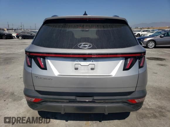 ✅ 2022 Hyundai Tucson Limited • VIN: 5NMJE3AE4NH130906 • Lot: 73320384. Wystawiony na Copart z przebiegiem 34 999 mil. Bezpłatny archiwum sprzedaży aukcyjnych z USA i szczegółowy raport historii pojazdu na DreamBid. Zdjęcie 6.