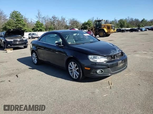 ✅ 2014 Volkswagen Eos Komfort • VIN: WVWBW8AH7EV000212 • Lot: 70678825. Wystawiony na Copart z przebiegiem 96 017 mil. Bezpłatny archiwum sprzedaży aukcyjnych z USA i szczegółowy raport historii pojazdu na DreamBid. Zdjęcie 14.