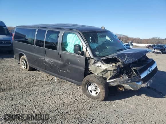 2016 Chevrolet Express Passenger LT with VIN 1GAZGPFF4G1243590, listed as a Copart auction lot 80019254 with Not provided miles and Salvage title. Bid and sale history available at DreamBid. Image 4.