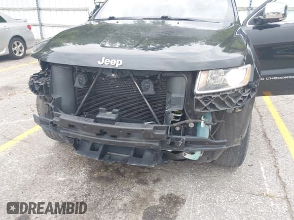 ✅ 2015 Jeep Grand Cherokee Limited • VIN: 1C4RJFBG9FC830985 • Lot: 43278241. Listed on IAAI with 154,948 mi. Free auction sales archive from the USA and detailed vehicle history report at DreamBid. Image 6.