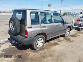 ✅ 1998 Chevrolet Tracker • VIN: 2CNBJ1369W6913198 • Лот: 42149796. Опубликован ранее на IAAI с пробегом 97 696 миль. Бесплатный доступ к архиву аукционных продаж из США и подробный отчёт об истории автомобиля на DreamBid. Изображение 4.