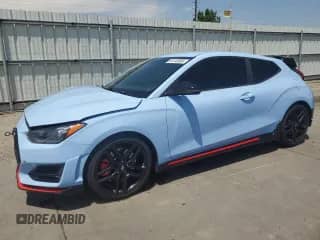 2020 Hyundai Veloster z VIN KMHT36AH4LU004802, wystawiony jako Copart lot #64146985 z przebiegiem 57 227 mil mil oraz Szkoda całkowita • Salvage title. Historia ofert i sprzedaży dostępna na DreamBid. Obrazek 1.