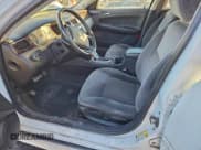 ✅ 2014 Chevrolet Impala LS • VIN: 2G1WA5E33E1125070 • Lot: 95118295. Listed on Copart with 86,756 mi. Free auction sales archive from the USA and detailed vehicle history report at DreamBid. Image 7.