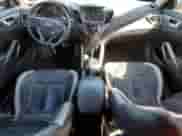 2013 Hyundai Veloster Turbo с VIN KMHTC6AE5DU122851, выставлен на аукционе Copart как лот 66115905 с пробегом 95 419 миль миль и Списание • Salvage title. История ставок и продаж доступна на DreamBid. Изображение 8.
