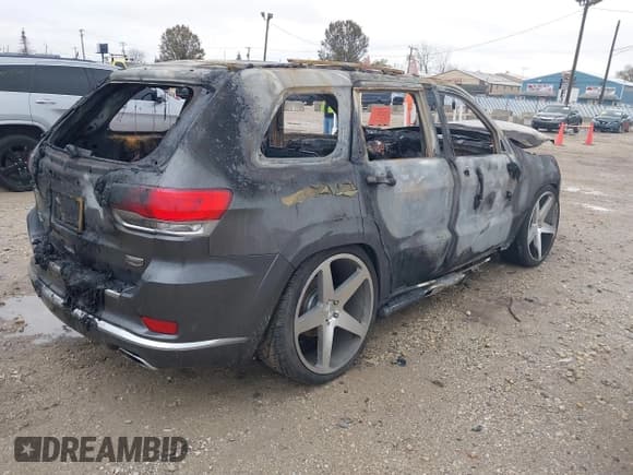 ✅ 2015 Jeep Grand Cherokee Summit • VIN: 1C4RJFJM4FC705593 • Lot: 40864637. Listed on IAAI with Not provided. Free auction sales archive from the USA and detailed vehicle history report at DreamBid. Image 4.