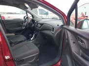 ✅ 2021 Chevrolet Trax LS • VIN: KL7CJNSB4MB352494 • Lot: 42561780. Listed on IAAI with 39,442 mi. Free auction sales archive from the USA and detailed vehicle history report at DreamBid. Image 5.