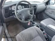 ✅ 2002 Toyota Tacoma PreRunner • VIN: 5TEGM92N12Z091590 • Лот: 90398105. Опубликован ранее на Copart с пробегом 141 853 миль. Бесплатный доступ к архиву аукционных продаж из США и подробный отчёт об истории автомобиля на DreamBid. Изображение 8.