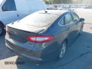 ✅ 2015 Ford Fusion Titanium • VIN: 3FA6P0SU8FR243611 • Lot: 43169838. Wystawiony na IAAI z przebiegiem 131 248 mil. Bezpłatny archiwum sprzedaży aukcyjnych z USA i szczegółowy raport historii pojazdu na DreamBid. Zdjęcie 4.