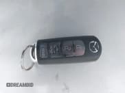 ✅ 2016 Mazda 3 S Touring • VIN: JM1BM1W38G1346953 • Лот: 42584351. Опубликован ранее на IAAI с пробегом 52 668 миль. Бесплатный доступ к архиву аукционных продаж из США и подробный отчёт об истории автомобиля на DreamBid. Изображение 11.