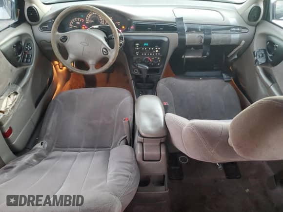 2001 Chevrolet Malibu z VIN 1G1ND52J11M614443, wystawiony jako Copart lot #79511864 z przebiegiem 108 172 mil mil oraz Szkoda całkowita • Salvage title. Historia ofert i sprzedaży dostępna na DreamBid. Obrazek 8.