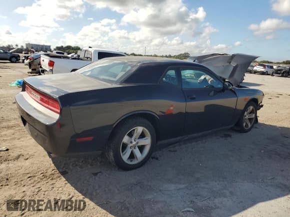 ✅ 2014 Dodge Challenger SXT • VIN: 2C3CDYAG6EH184864 • Лот: 85660624. Опубликован ранее на Copart с пробегом 105 204 миль. Бесплатный доступ к архиву аукционных продаж из США и подробный отчёт об истории автомобиля на DreamBid. Изображение 3.
