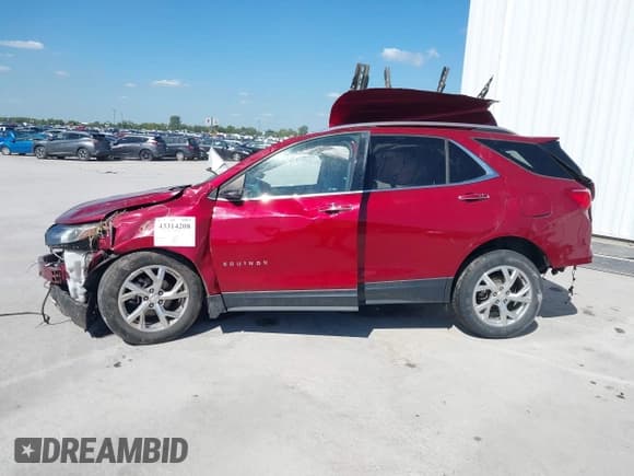 ✅ 2018 Chevrolet Equinox Premier • VIN: 2GNAXMEV2J6119535 • Лот: 43314208. Опубликован ранее на IAAI с пробегом 103 963 миль. Бесплатный доступ к архиву аукционных продаж из США и подробный отчёт об истории автомобиля на DreamBid. Изображение 6.