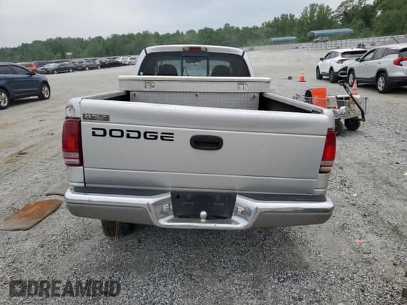 ✅ 2001 Dodge Dakota • VIN: 1B7GL22X01S173048 • Lot: 57018055. Wystawiony na Copart z przebiegiem 163 856 mil. Bezpłatny archiwum sprzedaży aukcyjnych z USA i szczegółowy raport historii pojazdu na DreamBid. Zdjęcie 6.