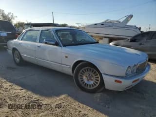 ✅ 1997 Jaguar XJ Vanden Plas • VIN: SAJKX6243VC791302 • Лот: 83742634. Опубликован ранее на Copart с пробегом 120 225 миль. Бесплатный доступ к архиву аукционных продаж из США и подробный отчёт об истории автомобиля на DreamBid. Изображение 4.