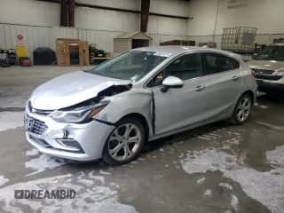 2018 Chevrolet Cruze Premier z VIN 3G1BF6SM2JS597410, wystawiony jako Copart lot #68855475 z przebiegiem 112 709 mil mil oraz Szkoda całkowita • Salvage title. Historia ofert i sprzedaży dostępna na DreamBid. Obrazek 1.