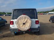 ✅ 2023 Jeep Wrangler Sahara • VIN: 1C4JJXP65PW555618 • Lot: 43005963. Listed on IAAI with 29,146 mi. Free auction sales archive from the USA and detailed vehicle history report at DreamBid. Image 16.