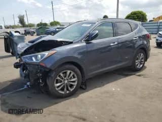 2017 Hyundai Santa Fe 2.0T с VIN 5XYZU4LA0HG489223, выставлен на аукционе Copart как лот 58305925 с пробегом 98 562 миль миль и Списание • Salvage title. История ставок и продаж доступна на DreamBid. Изображение 1.