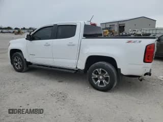 ✅ 2015 Chevrolet Colorado 4WD Z71 • VIN: 1GCGTCE31F1184572 • Лот: 74882534. Опубликован ранее на Copart с пробегом 126 698 миль. Бесплатный доступ к архиву аукционных продаж из США и подробный отчёт об истории автомобиля на DreamBid. Изображение 2.