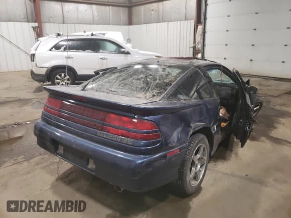 ✅ 1991 Mitsubishi Eclipse • VIN: 4A3CS54U5ME034104 • Lot: 82414954. Wystawiony na Copart z przebiegiem 474 141 mil. Bezpłatny archiwum sprzedaży aukcyjnych z USA i szczegółowy raport historii pojazdu na DreamBid. Zdjęcie 3.