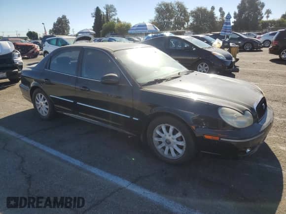 2002 Hyundai Sonata GLS с VIN KMHWF35H92A641858, выставлен на аукционе Copart как лот 80581244 с пробегом 124 020 миль миль и Чистый • Clean title. История ставок и продаж доступна на DreamBid. Изображение 4.