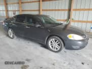 ✅ 2014 Chevrolet Impala LTZ • VIN: 2G1WC5E30E1131094 • Lot: 57468295. Listed on Copart with 196,198 mi. Free auction sales archive from the USA and detailed vehicle history report at DreamBid. Image 4.