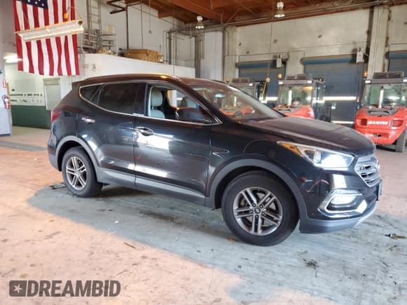 ✅ 2017 Hyundai Santa Fe 2.4L • VIN: 5XYZU3LB4HG414155 • Lot: 91306285. Listed on Copart with 100,058 mi. Free auction sales archive from the USA and detailed vehicle history report at DreamBid. Image 4.