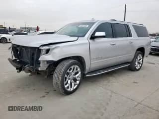 2019 Chevrolet Suburban Premier with VIN 1GNSCJKC7KR149136, listed as a Copart auction lot 45931855 with 56,750 mi miles and Clean title. Bid and sale history available at DreamBid. Image 1.