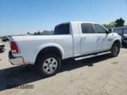 ✅ 2018 Ram 2500 Laramie • VIN: 3C6UR5NL2JG142720 • Lot: 62519285. Listed on Copart with 107,727 mi. Free auction sales archive from the USA and detailed vehicle history report at DreamBid. Image 3.