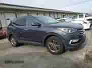 2017 Hyundai Santa Fe 2.4L z VIN 5NMZUDLB3HH025020, wystawiony jako Copart lot #84997425 z przebiegiem 139 041 mil mil oraz Szkoda całkowita • Salvage title. Historia ofert i sprzedaży dostępna na DreamBid. Obrazek 4.