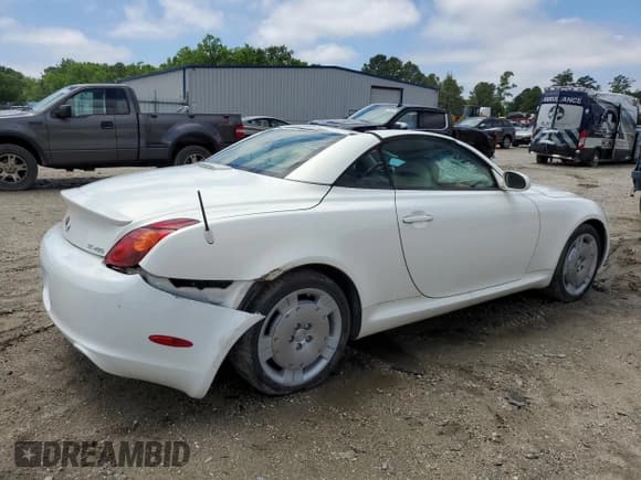 ✅ 2003 Lexus SC 430 • VIN: JTHFN48Y730038082 • Лот: 52608085. Опубликован ранее на Copart с пробегом 133 491 миль. Бесплатный доступ к архиву аукционных продаж из США и подробный отчёт об истории автомобиля на DreamBid. Изображение 3.