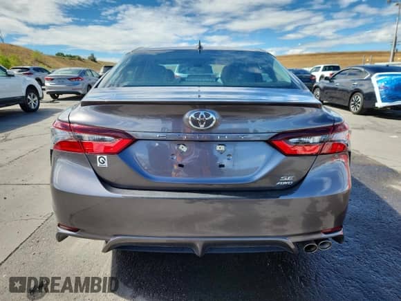 2022 Toyota Camry SE с VIN 4T1G11BK7NU055573, выставлен на аукционе Copart как лот 70327775 с пробегом 19 437 миль миль и Списание • Salvage title. История ставок и продаж доступна на DreamBid. Изображение 6.