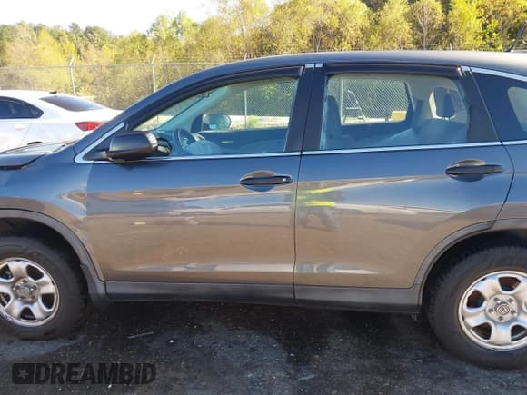 ✅ 2013 Honda CR-V LX • VIN: 3CZRM3H39DG710070 • Lot: 43602535. Listed on IAAI with 105,591 mi. Free auction sales archive from the USA and detailed vehicle history report at DreamBid. Image 14.
