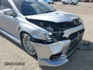 ✅ 2015 Mitsubishi Lancer Evolution GSR • VIN: JA32W8FV0FU006891 • Lot: 43414444. Wystawiony na IAAI z przebiegiem 58 316 mil. Bezpłatny archiwum sprzedaży aukcyjnych z USA i szczegółowy raport historii pojazdu na DreamBid. Zdjęcie 6.