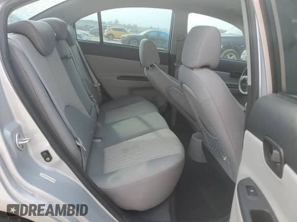 2010 Hyundai Accent GLS z VIN KMHCN4AC6AU500703, wystawiony jako Copart lot #82541114 z przebiegiem 188 357 mil mil oraz Szkoda całkowita • Salvage title. Historia ofert i sprzedaży dostępna na DreamBid. Obrazek 10.