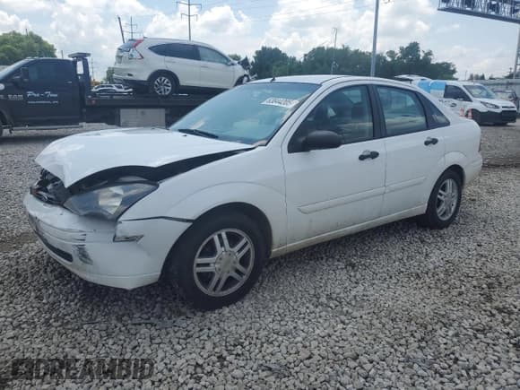 ✅ 2003 Ford Focus SE • VIN: 1FAFP34353W231334 • Lot: 63844205. Listed on Copart with 86,601 mi. Free auction sales archive from the USA and detailed vehicle history report at DreamBid. Image 1.