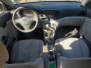 ✅ 2009 Hyundai Accent Auto GLS • VIN: KMHCN46C09U296808 • Лот: 54756365. Опубликован ранее на Copart с пробегом 104 820 миль. Бесплатный доступ к архиву аукционных продаж из США и подробный отчёт об истории автомобиля на DreamBid. Изображение 8.