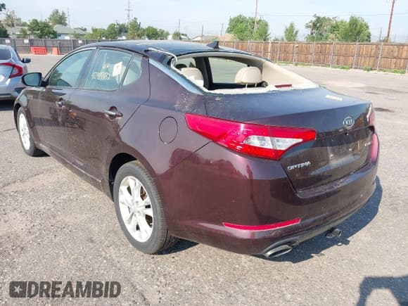 ✅ 2012 Kia Optima EX • VIN: 5XXGN4A65CG026199 • Lot: 42988682. Listed on IAAI with 156,272 mi. Free auction sales archive from the USA and detailed vehicle history report at DreamBid. Image 3.