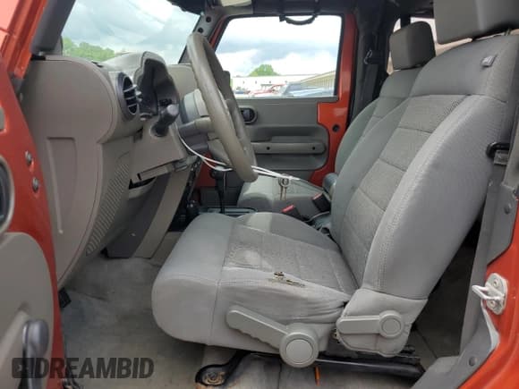 ✅ 2009 Jeep Wrangler X • VIN: 1J4FA24139L740959 • Lot: 56509075. Listed on Copart with 121,927 mi. Free auction sales archive from the USA and detailed vehicle history report at DreamBid. Image 7.