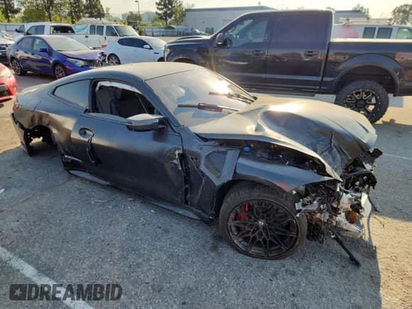 ✅ 2022 BMW M4 Competition • VIN: WBS33AZ03NCJ60062 • Lot: 64850285. Listed on Copart with Not provided. Free auction sales archive from the USA and detailed vehicle history report at DreamBid. Image 4.