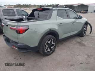 2022 Hyundai Santa Cruz Limited с VIN 5NTJEDAF2NH021914, выставлен на аукционе IAAI как лот 41299616 с пробегом 76 680 миль миль и . История ставок и продаж доступна на DreamBid. Изображение 4.