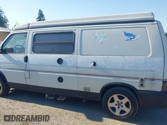 ✅ 1999 Volkswagen EuroVan CV • VIN: WV2EH8707XH000531 • Лот: 42675971. Опубликован ранее на IAAI с пробегом 141 233 миль. Бесплатный доступ к архиву аукционных продаж из США и подробный отчёт об истории автомобиля на DreamBid. Изображение 14.