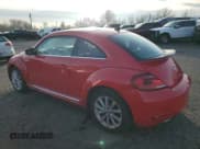 ✅ 2018 Volkswagen Beetle SE • VIN: 3VWJD7AT4JM703168 • Лот: 83746544. Опубликован ранее на Copart с пробегом 18 012 миль. Бесплатный доступ к архиву аукционных продаж из США и подробный отчёт об истории автомобиля на DreamBid. Изображение 2.
