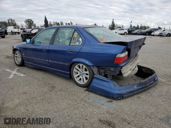 1997 BMW 3 Series z VIN WBACD3322VAV21297, wystawiony jako Copart lot #43254895 z przebiegiem Nie podano mil oraz Szkoda całkowita • Salvage title. Historia ofert i sprzedaży dostępna na DreamBid. Obrazek 2.